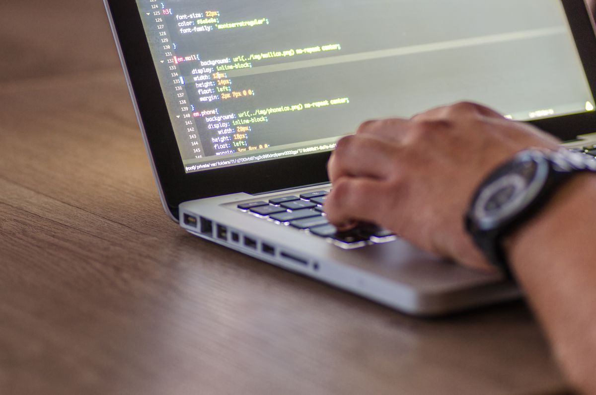 Code editor interface on a developer laptop screen, symbolizing Cursor AI coding workflow